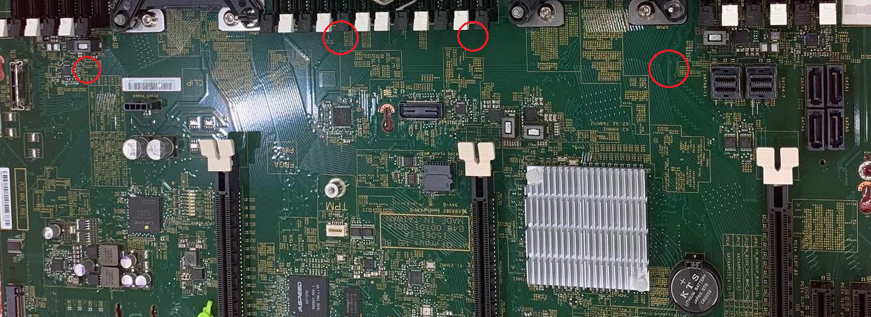 Photograph of a physical motherboard with the component locations marked.